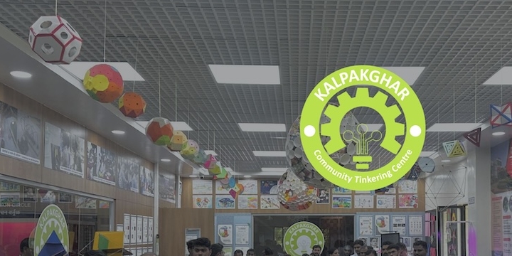 a representative image of the Kalpakghar space with displays of paper models of various shapes from the ceiling